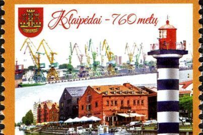 a lithuanian stamp featuring the klaipeda lighthouse